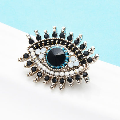 Wuli&amp;baby Small Rhinestone Black Blue Eye Brooches Women Alloy Simulated Pearl Eye Collar Pins Gifts